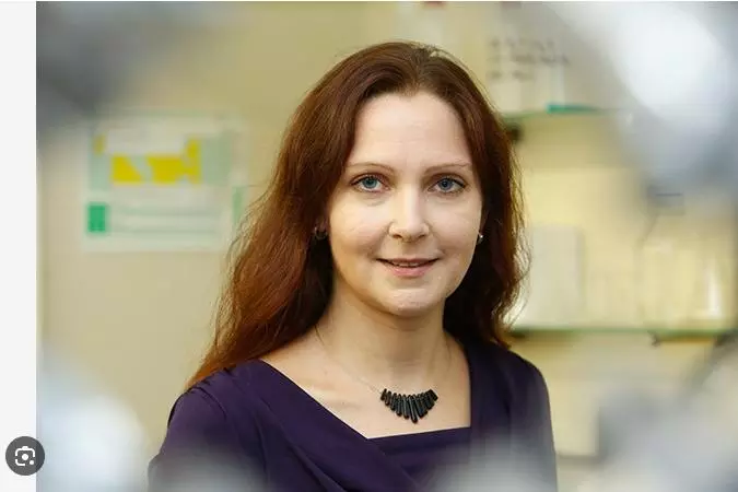 Woman smiling into camera